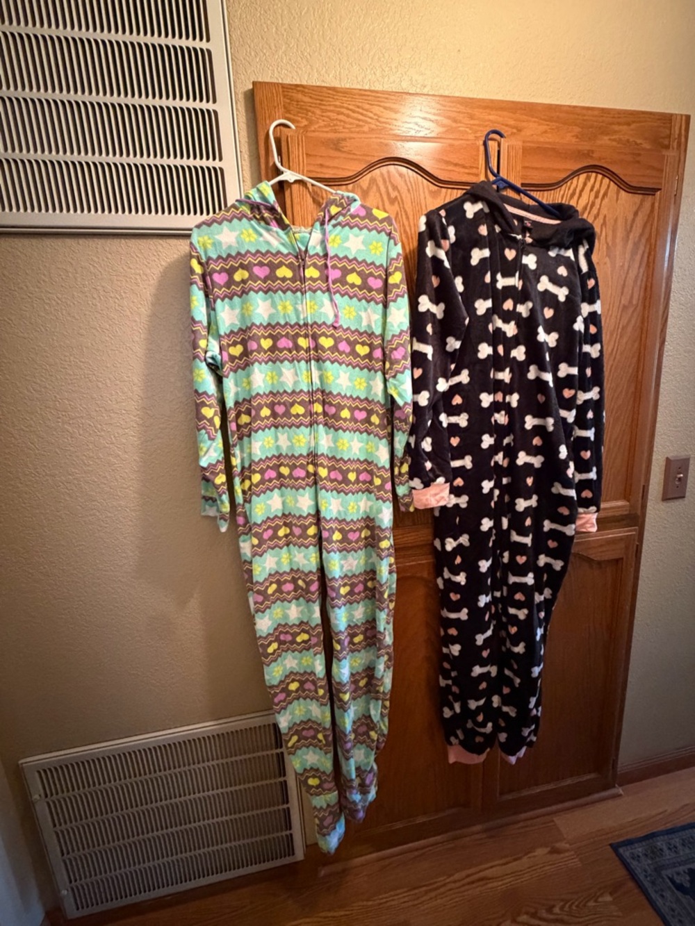 Women’s Soft Fleece Onesies - stars/hearts  & doggy hood Black Bone Print